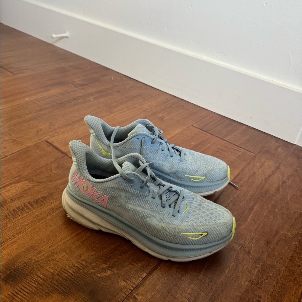Hoka One One Kids Light Blue Sneakers with Pink Logo and Yellow Accents